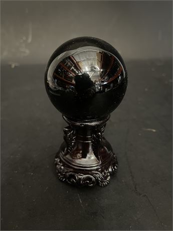 Black Crystal Ball On Decorative Stand