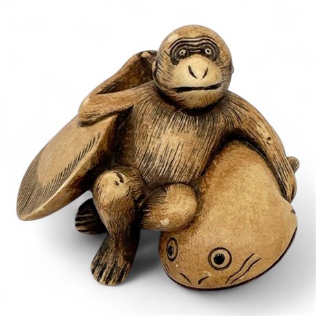 Japanese Netsuke Carving Of Monkey Resting On Namazu