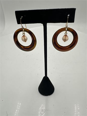 Pair Of Copper-Colored Dangle Earrings With Center Crystal