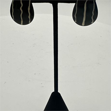 Black Enamel Clip-On Earrings with Wavy Line Design